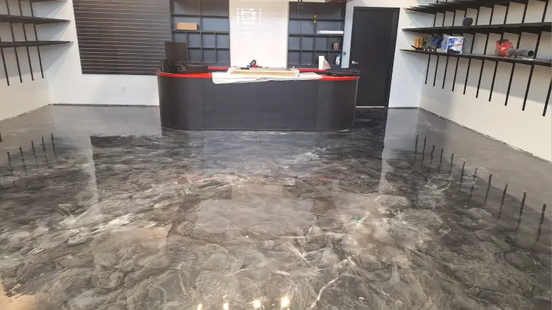 An office lobby with professional black epoxy flooring.