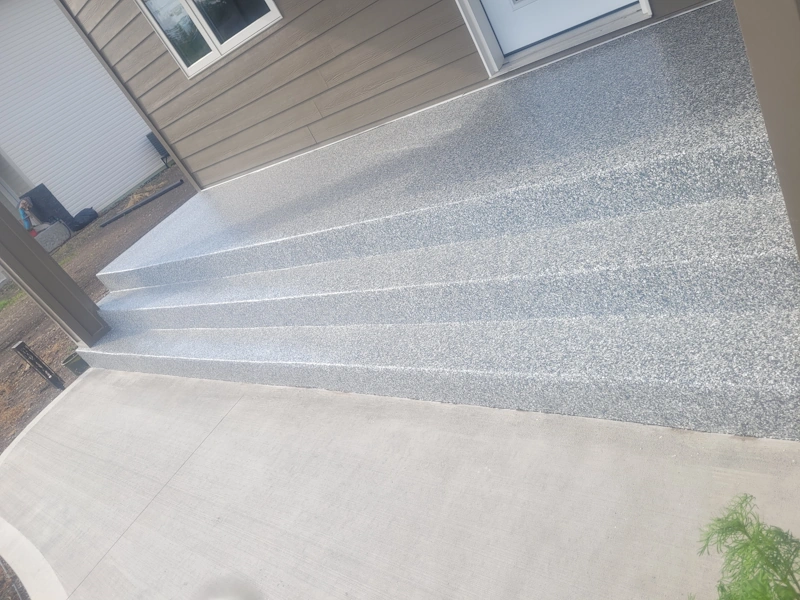 polyaspartic, full flake flooring system installed on front porch of house